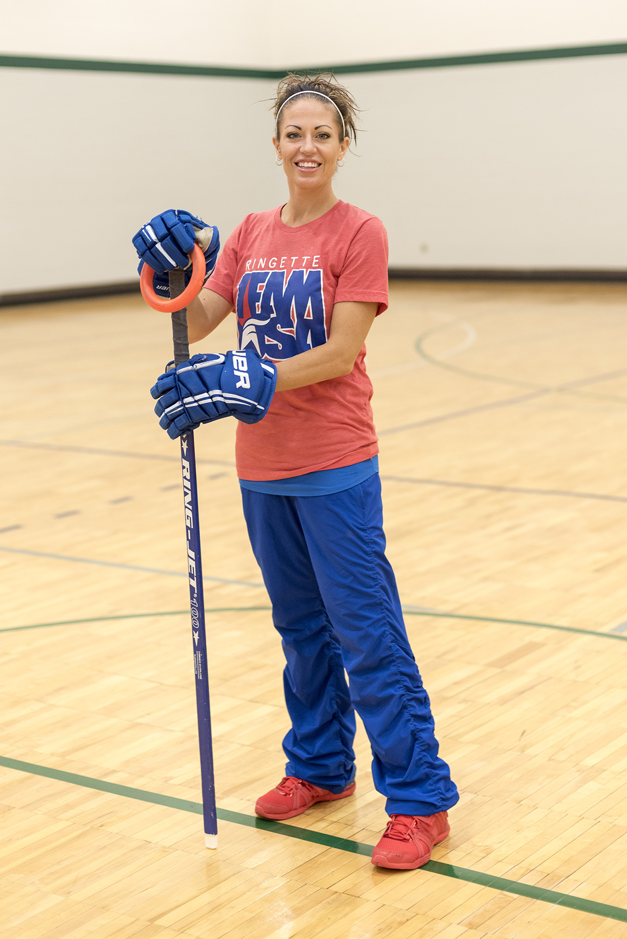 Renee Hoppe in gym with ringette gear