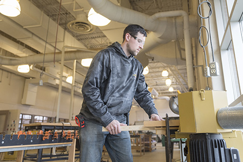 Adam working in the construction lab.