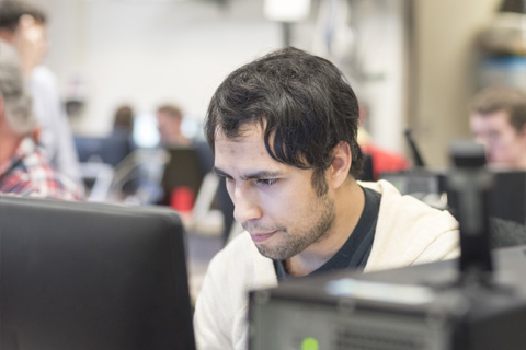 Big Thinker - Estefan Cervantes Estefan working in a computer lab.