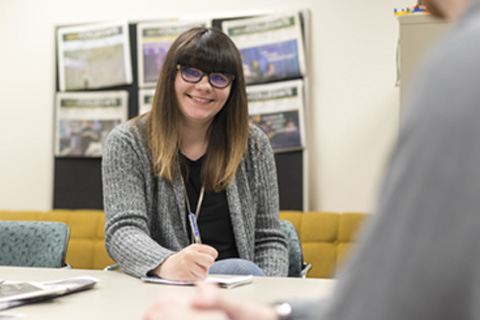 Big Thinker - Jessica Sierocki Justine working in the Collegiate office.
