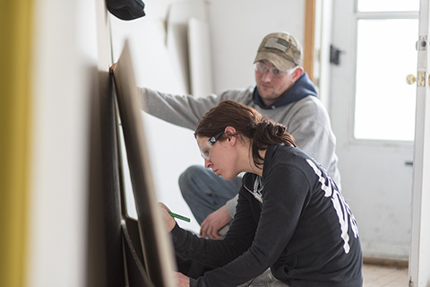 Big Thinker - Meagan Lepien Meagan working at the Habitat for Humanity house.