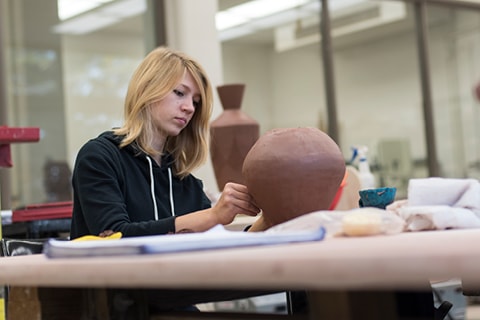 Art student with instructor