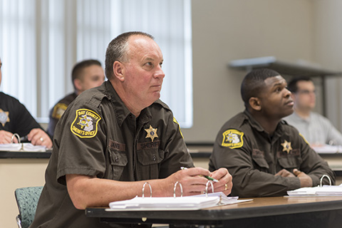 A classroom of law enforcement professionals