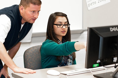 Instructor working with students in class.