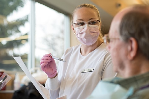 dental student with patient