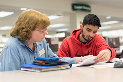 Student working with a tutor