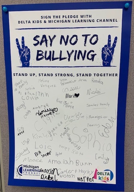 Signed anti-bully pledge poster