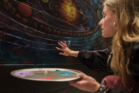 Delta College art students spent the winter semester painting a mural on the interior walls of the Delta Dome Observatory.