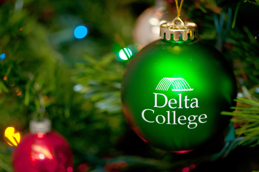 Delta College ornament on a tree.