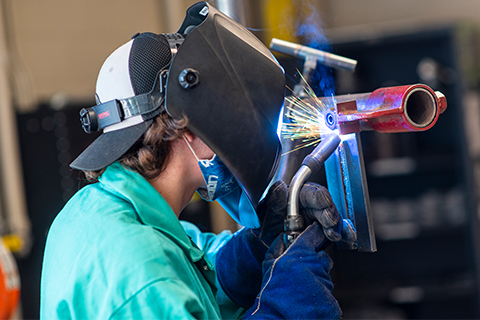 Photo of a welding student