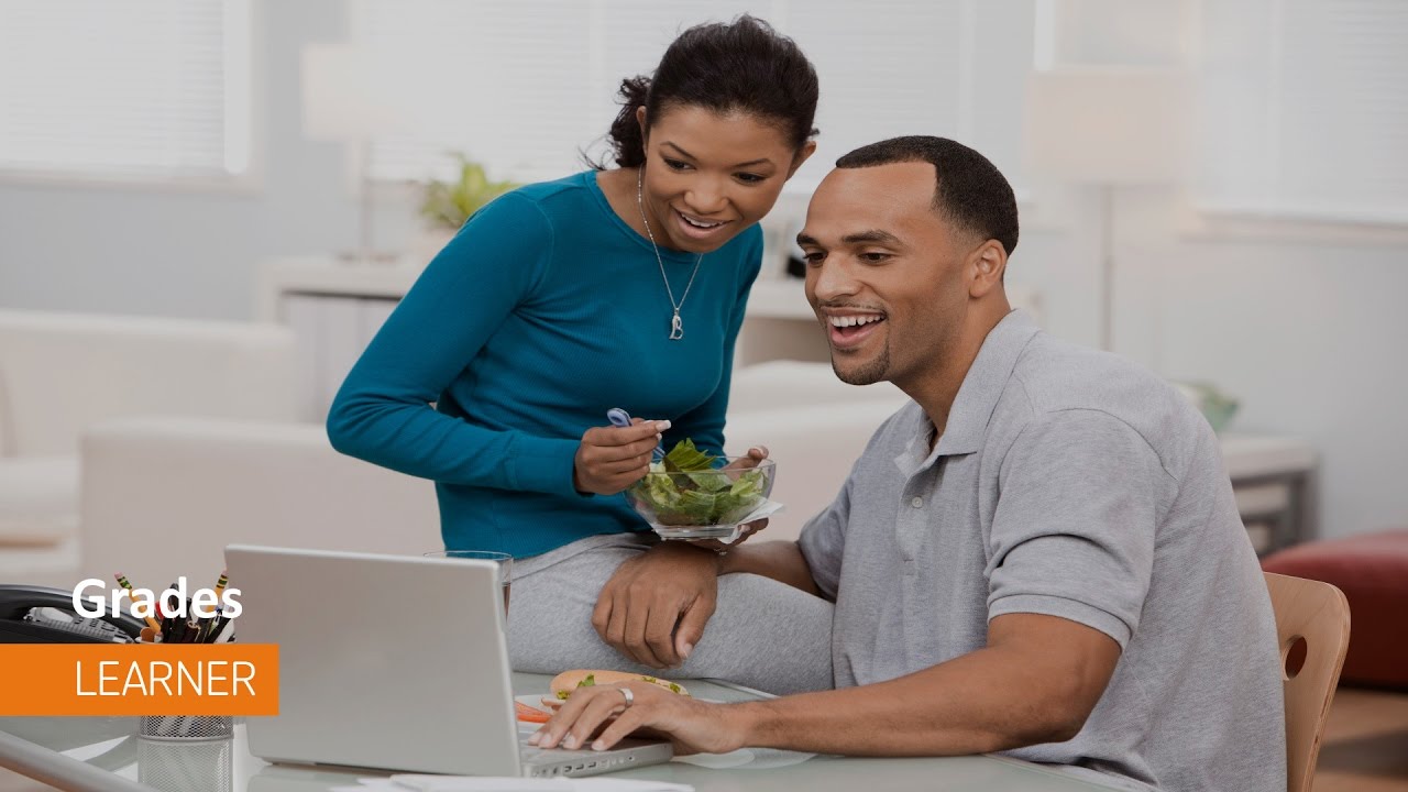 Family reviewing their grades online.