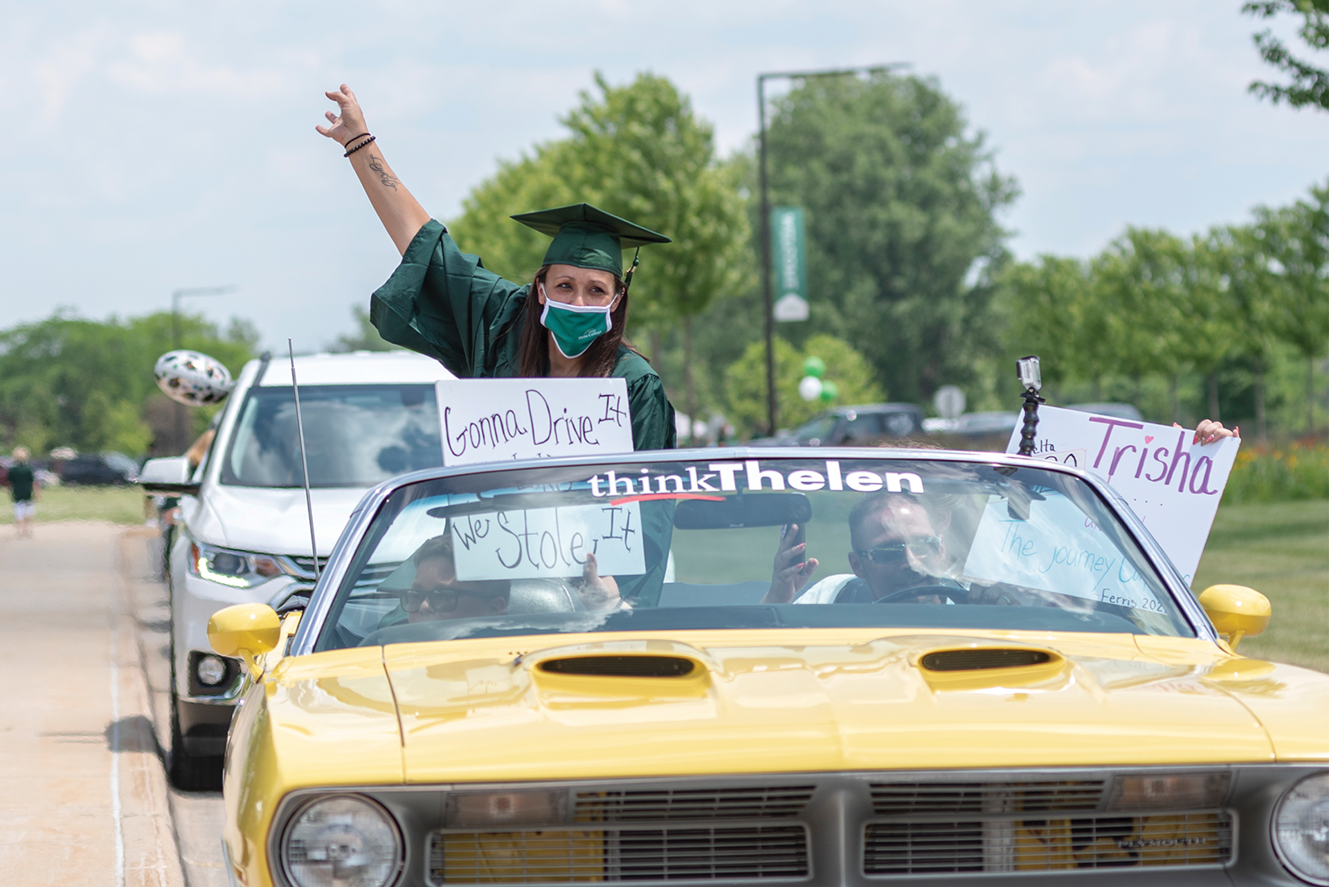 Graduate in car at Cruise-In Commencement