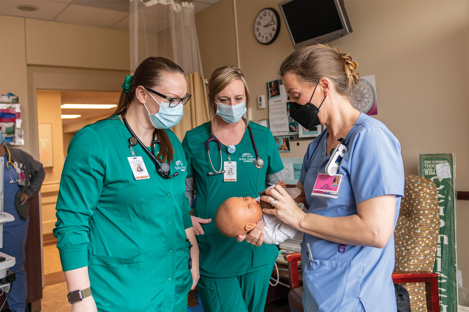 Nursing students with instructor