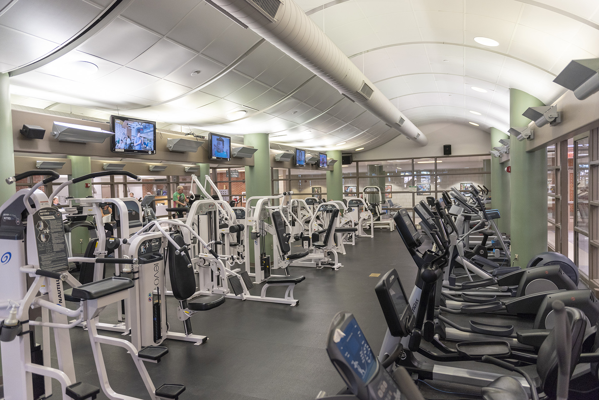 The cardio room has treadmills, ellipticals, weight machines and more.