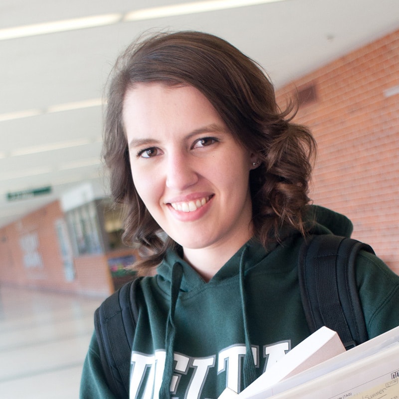 Smiling Delta student