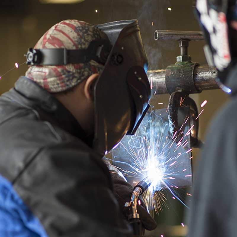 Students practicing welding