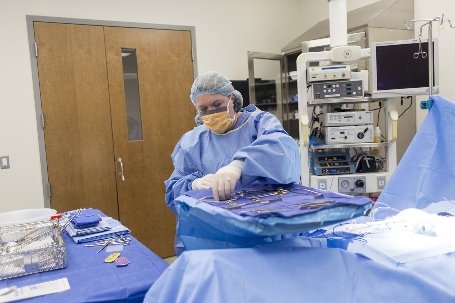 Student working in surgical lab.