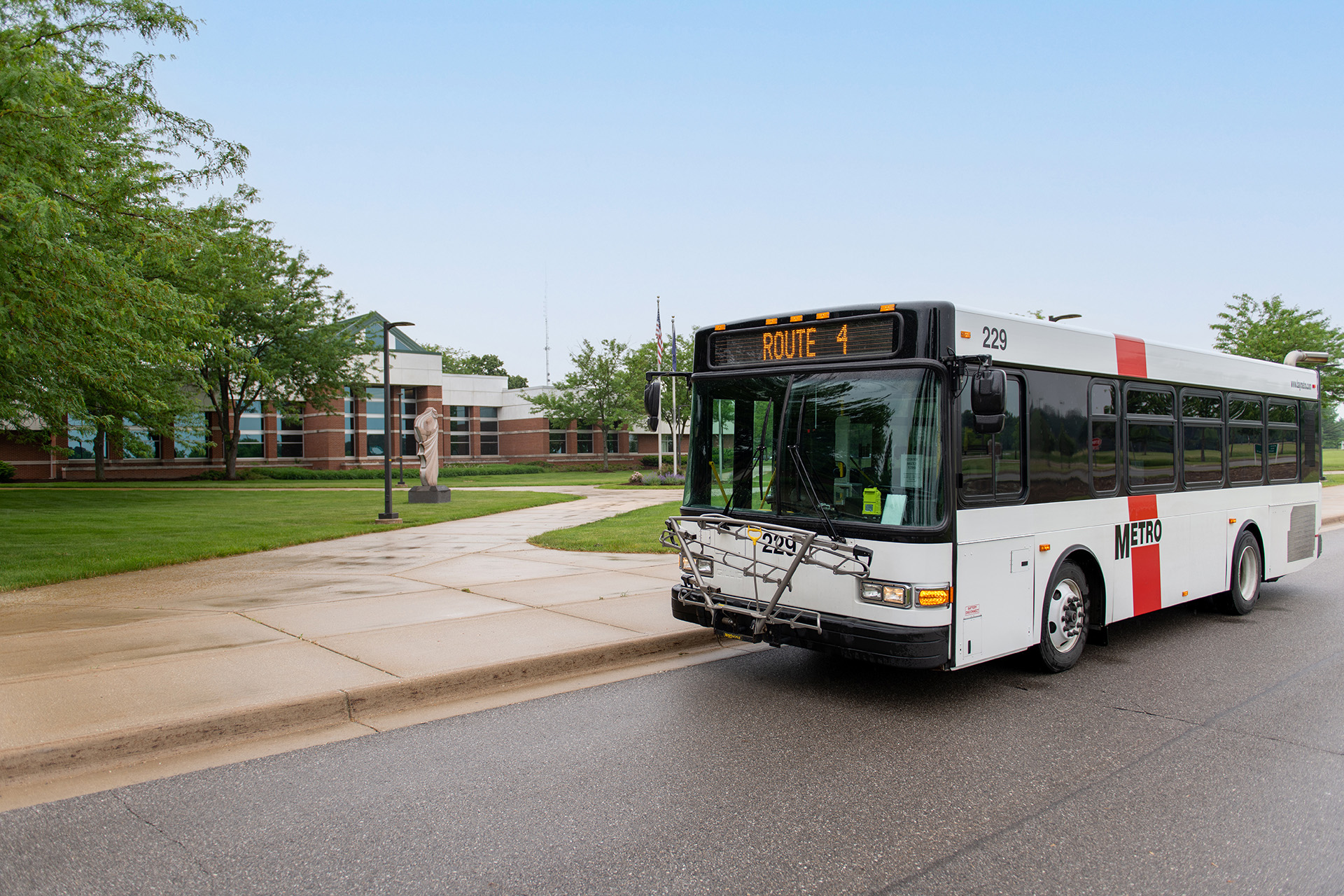 Metro bus in front of Delta's main campus