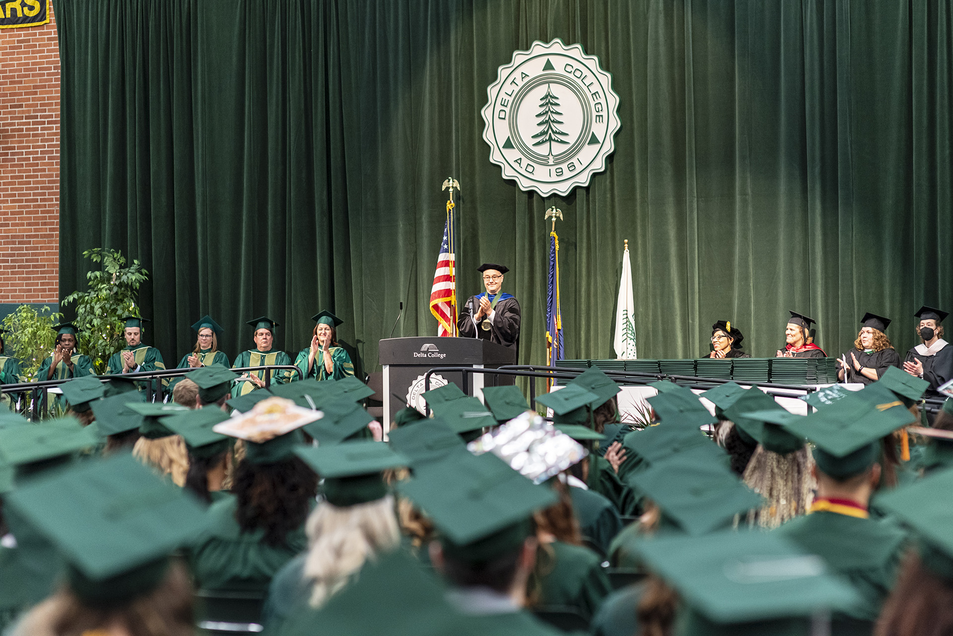 Board seating behind Dr. Goodnow at Commencement