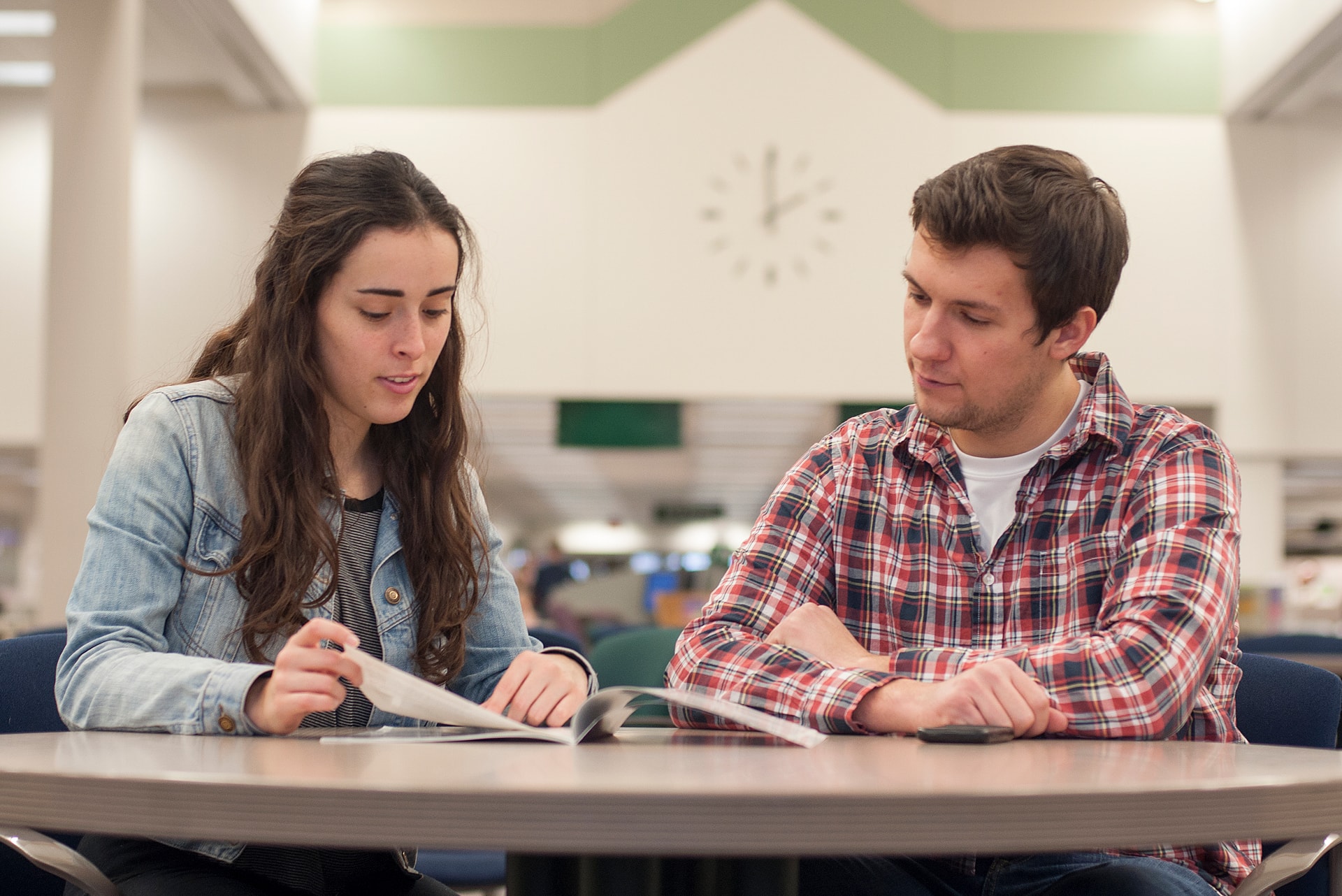 Two students studying in library